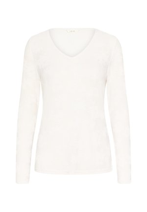 Garais piedurkņu baltais tops ar V veida izgriezumu, izgatavots no mīkstas, strukturētas auduma ar niansētu ziedu rakstu. Vienkāršs un pieguļošs dizains.