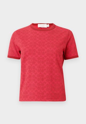 Czerwona bawełniana koszulka z krótkim rękawem, z tonowanym wzorem splatających się kółek oraz okrągłym dekoltem z kontrastową lamówką.