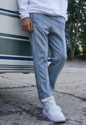 Nike Sportswear CIRCA PANT - Tracksuit bottoms - particle grey/coconut milk
