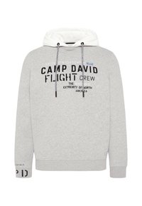 Felpa grigia in pile con cappuccio foderato di bianco. Presenta disegni di testo in nero e blu, incluso "CAMP DAVID FLIGHT CREW." Con cordini regolabili.