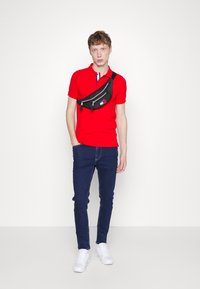 Tommy Jeans SLIM PLACKET - Polo - deep crimson