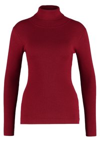 Maglione rosso a collo alto a coste, con maniche lunghe e un design aderente, caratterizzato da una texture liscia e un colletto alto.