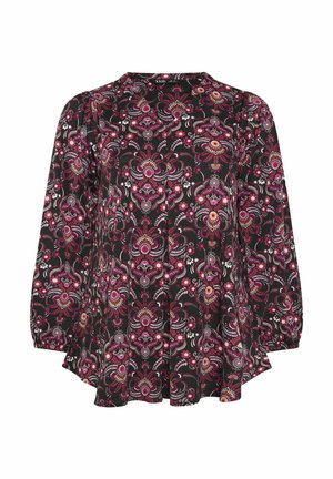 Schwarze Bluse mit floralen Mustern in Rosatönen, Rot und Weiß. Sie hat lange Ärmel und einen runden Halsausschnitt, sowie geraffte Details in der Taille.