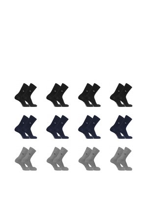 Huit paires de chaussettes noires, bleu marine et grises disposées en trois rangées sur un fond blanc.
