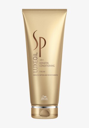 Goldfarbene Tube der Wella Professionals SP LuxeOil Keratin-Nahrungspflegecreme mit Klappverschluss, entwickelt zur Erweichung und zum Schutz von Haar-Keratin.