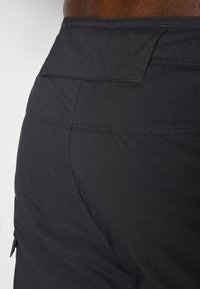 The North Face WINTER EXPLORATION TAPERED CARGO  - Hlače za na prostem - black
