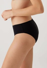 Zwarte katoenen high-waisted slip met een gladde, rekbare textuur. Kenmerken zijn een brede tailleband en naadloze randen voor comfort.