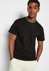 Lacoste T-shirt med print - noir