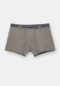 Sive bokserice napravljene od mekog materijala, s mornarskoplavim elastičnim remenom s logotipom "PULL&BEAR". Standardni dizajn s laganim konturama.