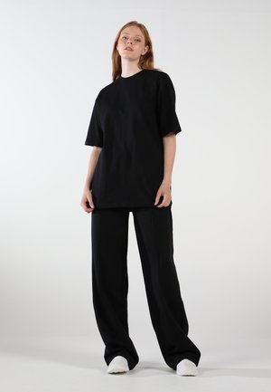 WIDE LEG PALAZZO E - Tracksuit bottoms - inky black