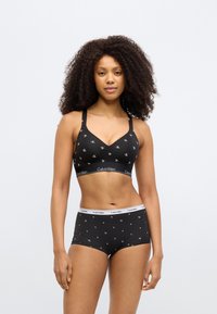 Σετ μαύρου βαμβακερού σουτιέν bralette και σορτς boyshort με μοτίβο από μικρά λευκά λογότυπα και αστέρια, με ελαστική μέση με λογότυπο.