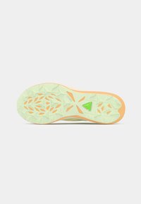 Traction sole with a light green textured surface, orange midsole, and a green accent triangle. Features star-shaped tread patterns for grip.
