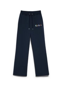 Pantaloni tuta blu navy con vita elastica, cordino e tasche laterali. Presentano un ricamo multicolore "Kickers" sulla gamba.
