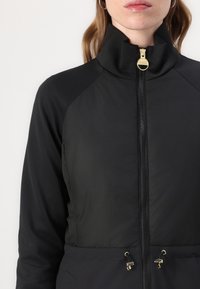 Barbour International QUILTED - Casaco leve - black