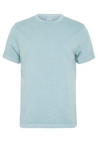 T-shirt en coton bleu clair avec un col rond, des manches courtes et une coupe décontractée. Présente une texture douce et subtile ainsi que des coutures soignées.