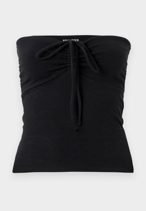 Haut noir sans manches en tissu doux, doté d'un cordon à l'avant pour un ajustement, avec une texture lisse et un design ajusté.