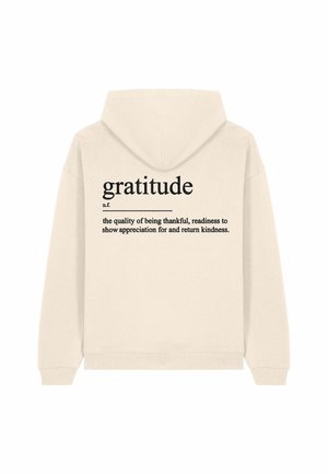 Cream hoodie with a drawstring hood. Back features "gratitude" in large black font, with a definition in smaller print below.