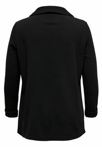 Černý dlouhý kabát s texturovaným materiálem, se zářezovým límcem a ohrnutými rukávy. Má rovný lem a minimalistický design.