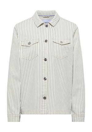 Veste blanche à manches longues avec fines rayures noires verticales, fermeture à boutons, poches à rabat sur la poitrine et col classique, vue de face.