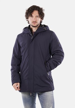 Giacca impermeabile blu navy con zip frontale, cappuccio regolabile e tasche laterali con fodera interna per un caldo extra.