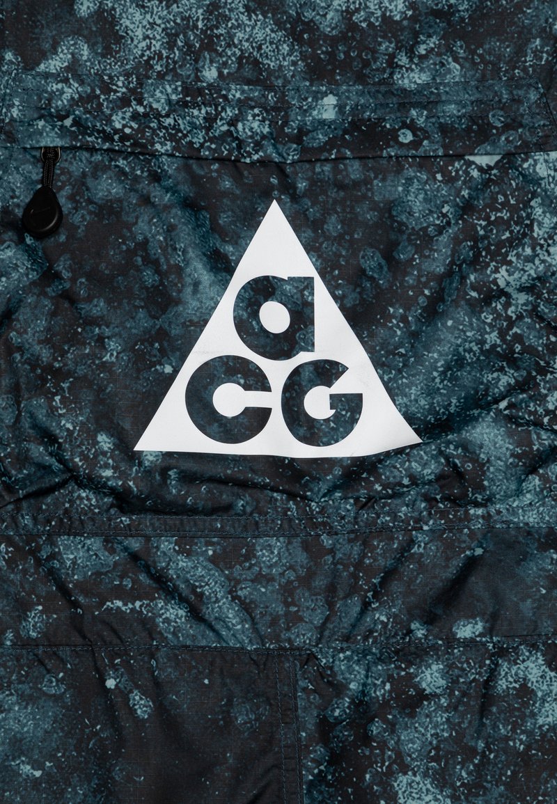 Nike ACG Pantalon de ski denim turquoise/armory navy/black/bleu