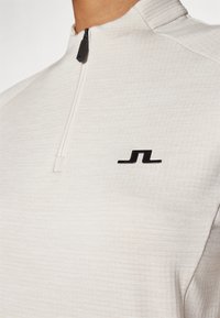 J.LINDEBERG Sports STEFFI MID LAYER - Sudadera - moonbeam