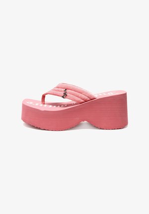 Infradito rosa con platform, dotate di una cinghia imbottita, texture trapuntata e un piccolo dettaglio a forma di ancora in argento sulla cinghia, con una suola rigata.