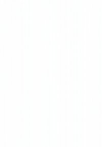 Pessoa com máscara facial, cabelo longo e escuro, usando óculos e um cachecol, em pé diante de uma parede de tijolos branca.