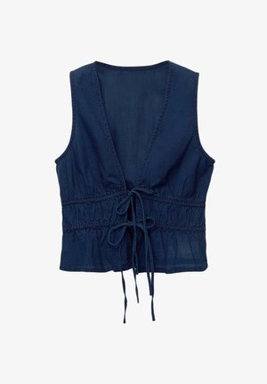 Mornarsko modra brezrokavna majica z globokim V-očesom, zategnjenim pasom in zavezovanjem. Narejena iz lahkotnega materiala z rahlo teksturiranim zaključkom.