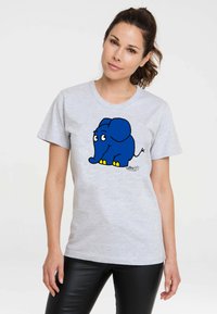 Light gray T-shirt featuring a cartoon blue elephant design with yellow feet, short sleeves, and a classic crew neckline.