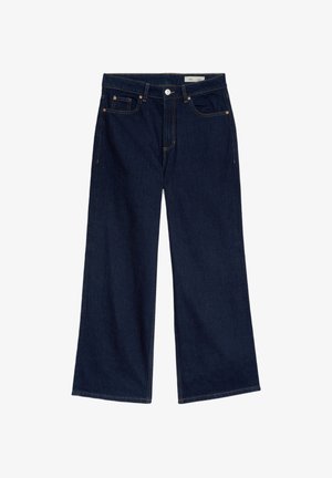Jean en denim bleu foncé à jambes larges, taille haute, design à cinq poches, rivets en cuivre et coutures jaunes contrastantes.