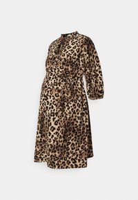 Robe de maternité imprimée léopard avec une coupe longueur genou, des manches longues bouffantes, une taille à nouer et un col. Confectionnée en tissu doux.