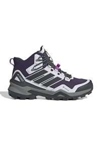 Korkeavartinen vaelluskengät violettina, mustana ja valkoisena Gore-Tex-materiaalista, kestävällä pohjalla ja turvallisella nauhoitusjärjestelmällä ulkoiluun.