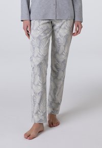 Pantaloni pigiameria leggeri di un grigio chiaro con motivo a foglie di palma bianche. Caratterizzati da una vestibilità dritta e una vita elastica. Materiale in cotone morbido.