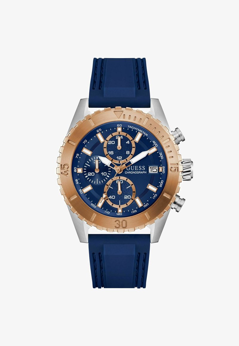 Montre chronographe pour homme avec un cadran bleu, des accents en or rose et un bracelet en caoutchouc bleu. Elle présente trois sous-cadrans et un affichage de la date.
