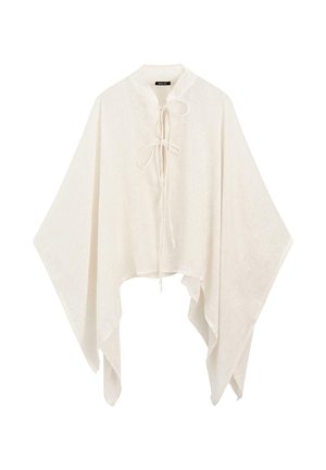 Witte loszittende poncho met wijde mouwen en twee striksluitingen aan de voorkant, gemaakt van lichtgewicht stof.