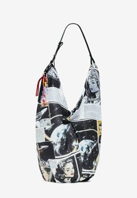 Riidest valmistatud hobo-kott, millel on mustvalged ajakirjakäärimised ja kosmilised mustrid, must õlapael ning värvilised helmenipid.