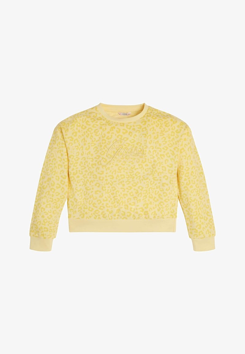 Sweat-shirt jaune court avec un motif léopard subtil, col et poignets côtelés, avec le logo "Guess" brodé de la même couleur.