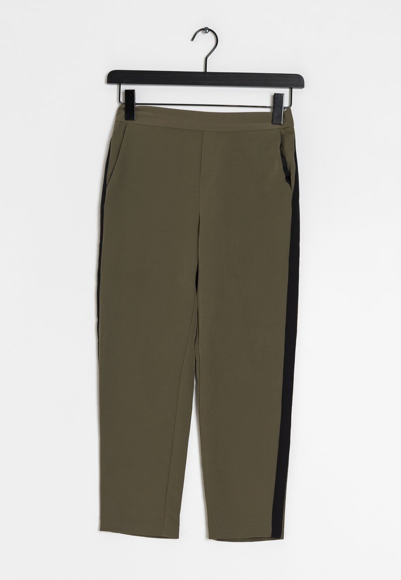 Olive green pants with a black side stripe, featuring a smooth texture, elastic waistband, and two side pockets. Hanging on a black hook.