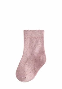 Pinkfarbene Knöchelsocke aus strukturiertem Strickmaterial, mit einem gewellten oberen Rand und einem subtilenSchimmer.