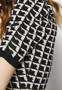 Morgan Tubino - black