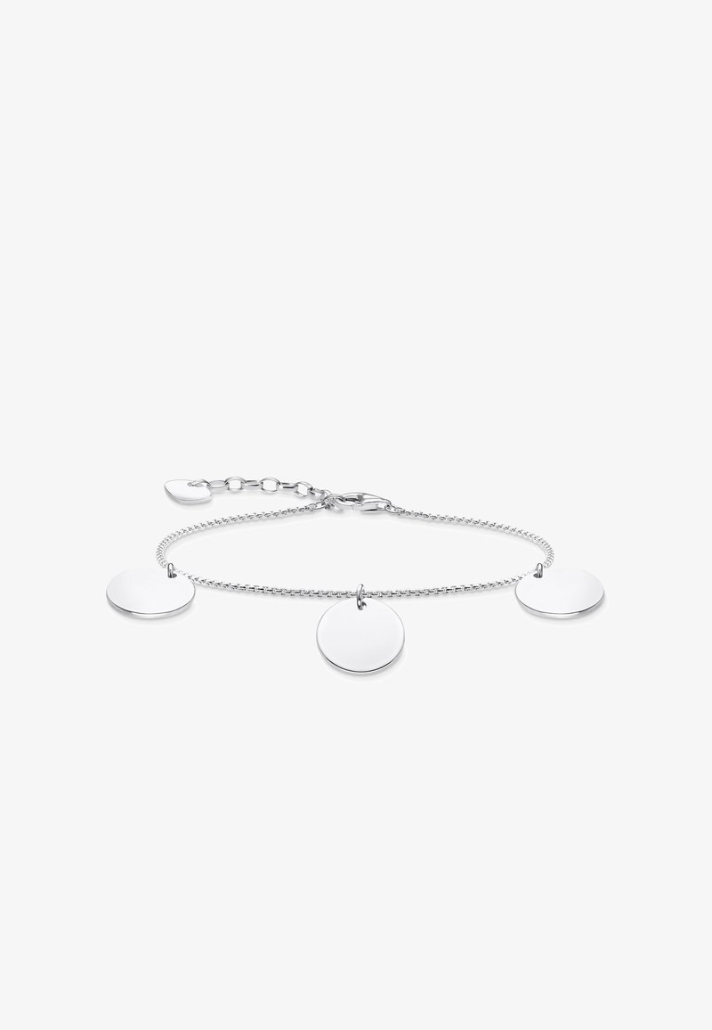 Sidabro grandinėlė su trimis plokščiomis apvalių pakabukų. Grandinės jungtys yra mažos ir apvalios, su omarų užsegimu ir reguliuojamu ilgiu.