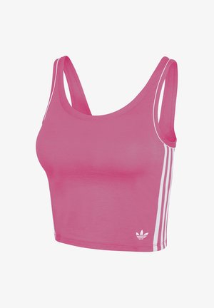 Roze crop top van zachte stof. Kenmerkt zich door brede bandjes en contrasterende witte verticale strepen aan de zijkanten. Klein logo onderaan.