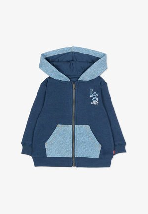 Felpa con cappuccio blu navy con cerniera, cappuccio e tasche con motivo azzurro. Presenta un logo sul petto e polsini a coste. Tessuto dalla texture morbida.