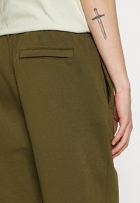 Puma Jogginghose - gruen