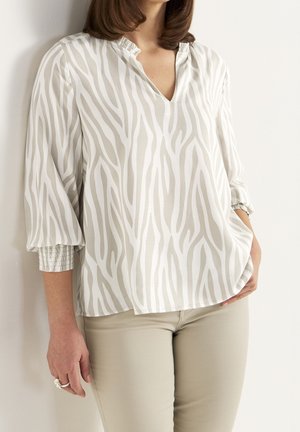 Blusa - beige