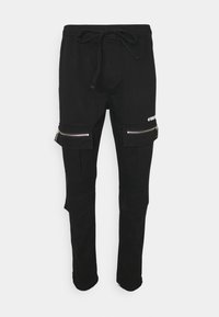 Pantaloni cargo neri in cotone con vita regolabile tramite cordoncino, dotati di tasche frontali con zip e design con bordo alla caviglia aderente.