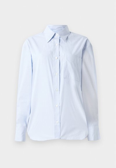 Light blue button-up shirt made of cotton, featuring a pointed collar, long sleeves, a chest pocket, and a straight hemline.