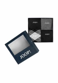 Scatola regalo nera con coperchio trasparente che mostra quattro paia di calzini in nero, grigio scuro e motivi argyle, con il logo "JOOP!" su ogni calzino.