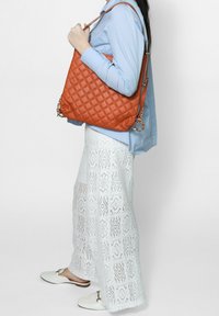 Roberta Rossi Rugzak - shoulder bag convertible into a backpack